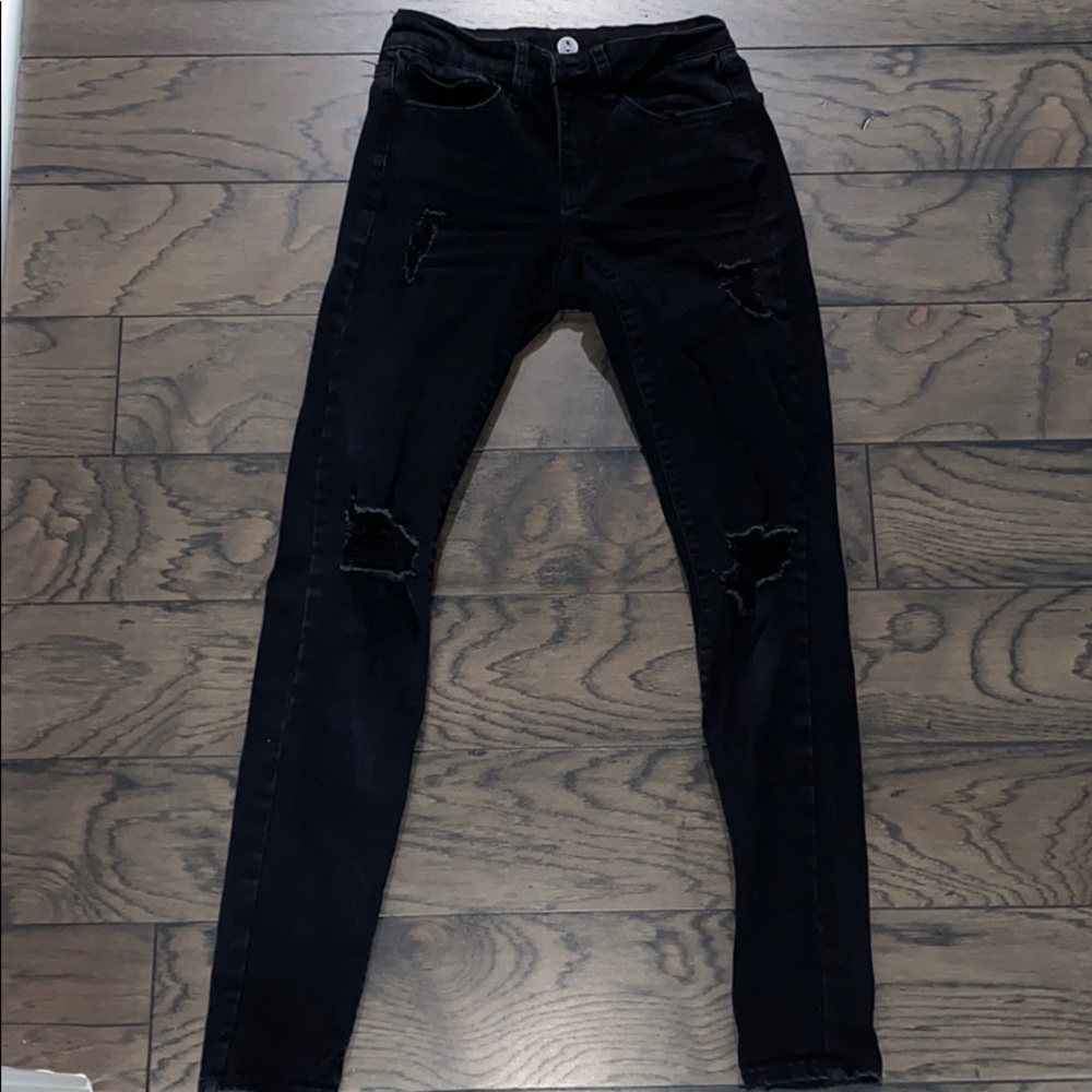 ripped black jeans